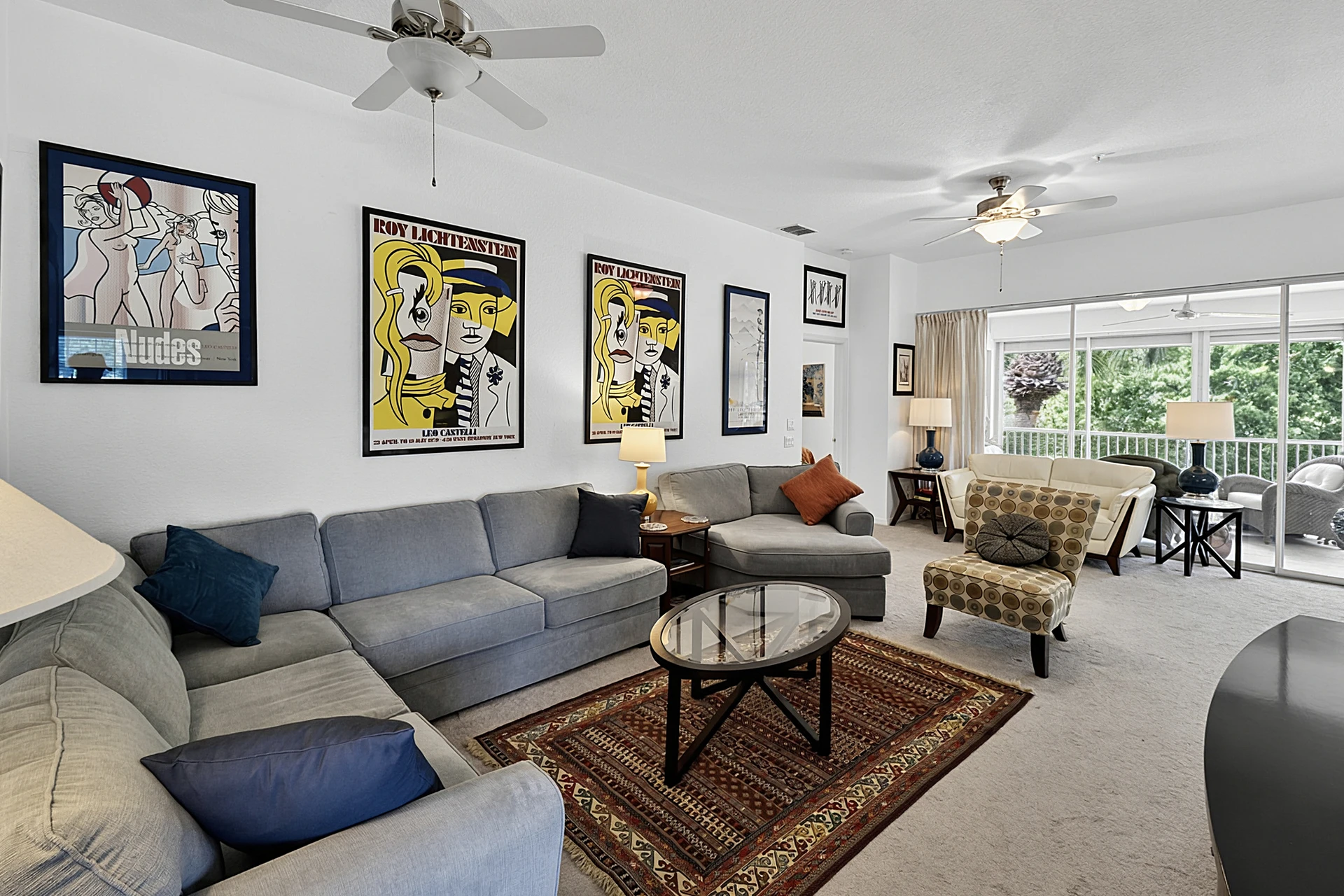 Living room with lanai views at Calusa Bay